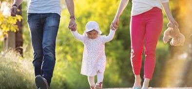 parents walking with child_283830788_web_small_NOL.jpg