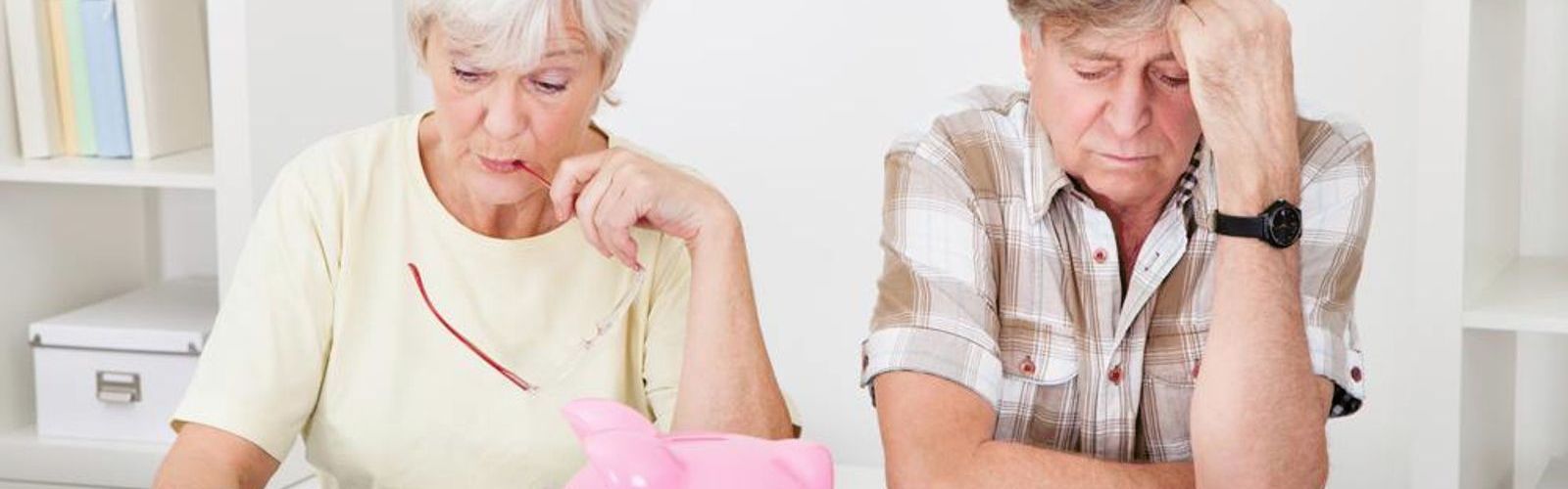 older people saving for pension piggy bank_172959095_web.jpg