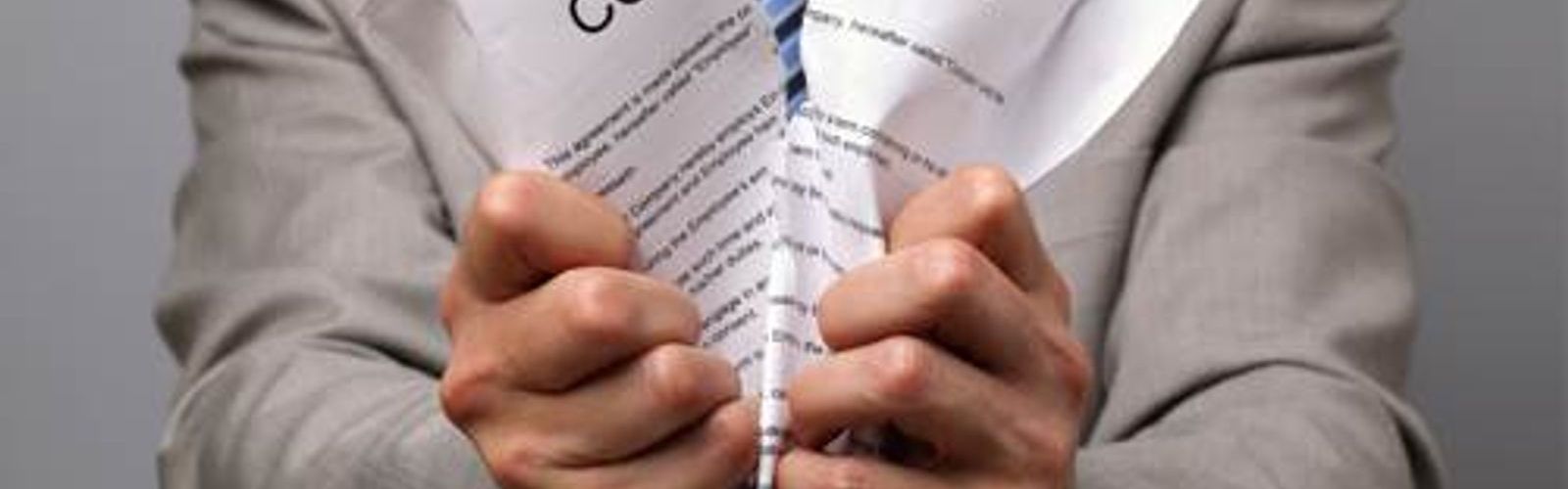 man ripping up contract_152142197_web_small_NOL.jpg