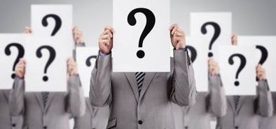 men in suits holding question marks_297295946_web_small_NOL.jpg