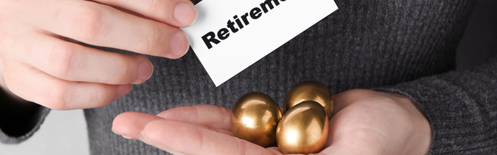 Golden eggs and sign saying retirement (bs233151391).jpg