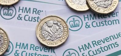 Coins on HMRC background (bs366727717).jpg