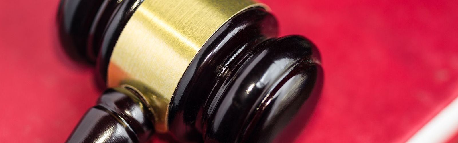 Gavel on red background (bs160145321).jpg