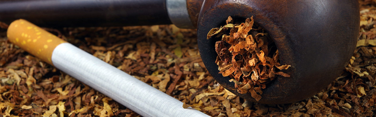 bigstock-Smoking-Pipe-And-Cigarette-Ci-403532108_reduced_.jpg