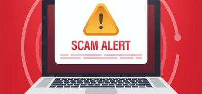 Scam alert on laptop (bs392079872).jpg