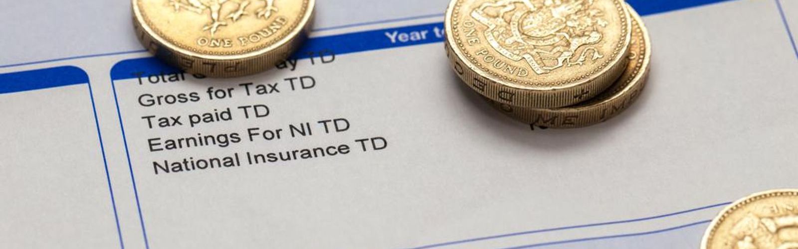 payslip with coins on_214518190_web.jpg