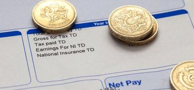 payslip with coins on_214518190_web.jpg