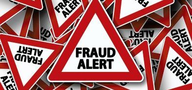 fraud alert road sign.jpg