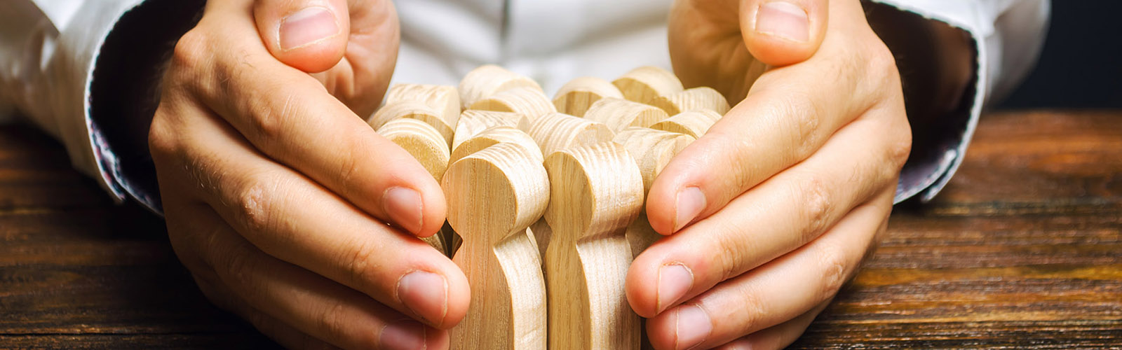 hands surrounding people - job retnetion scheme - protect employees (bs319703584).jpg