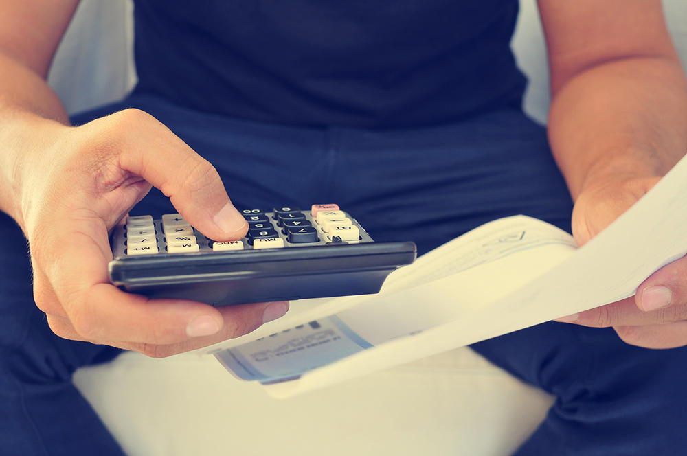 man calculating - apprentice payroll (bigstock 87329072)_web.jpg