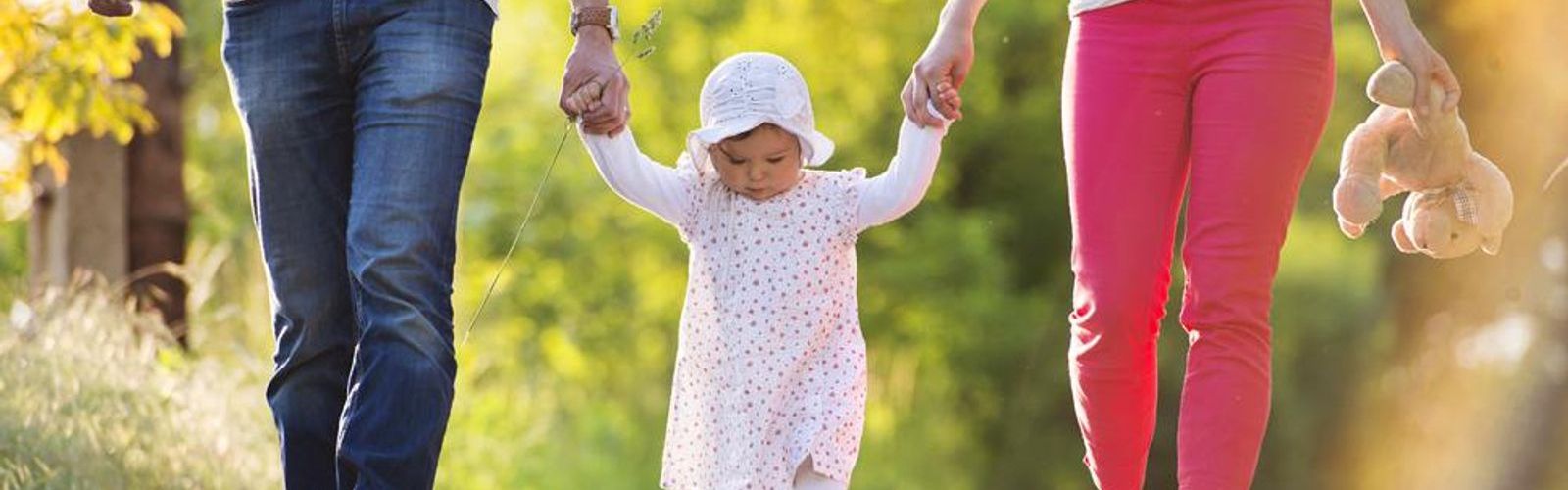 parents walking with child_283830788_web.jpg