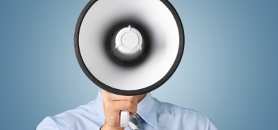 man holding megaphone over face__consultation (bs 108762131)_web.jpg