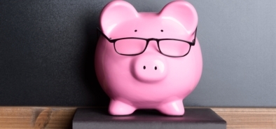 bigstock-Piggy-Bank-With-Eye-Glasses-On-80307374.jpg